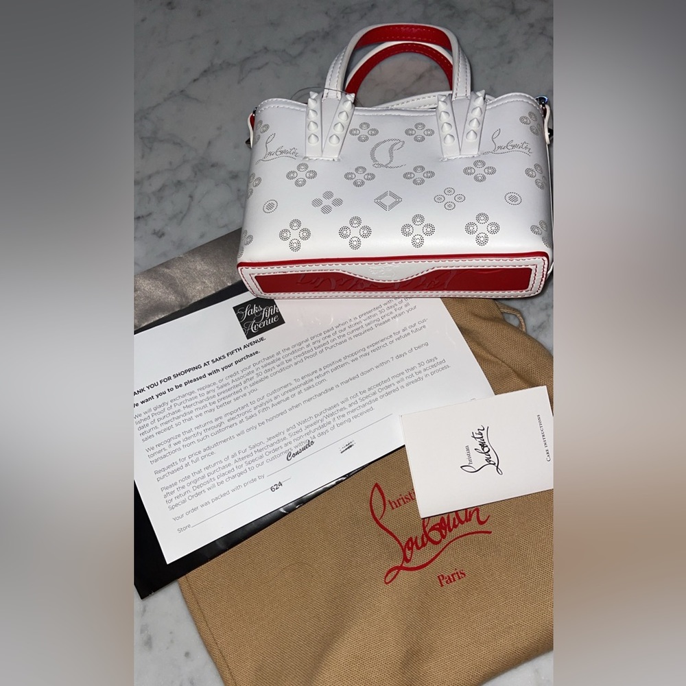 CHRISTIAN LOUBOUTIN
Cabata perforated-leather mini tote bag